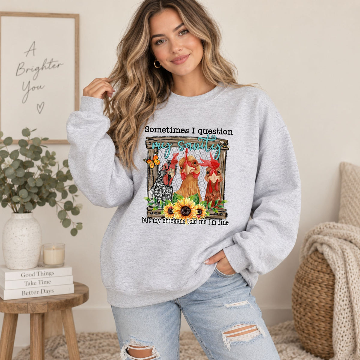 Grey Gildan crewneck sweatshirt worn by model, featuring chicken graphic and quote text.