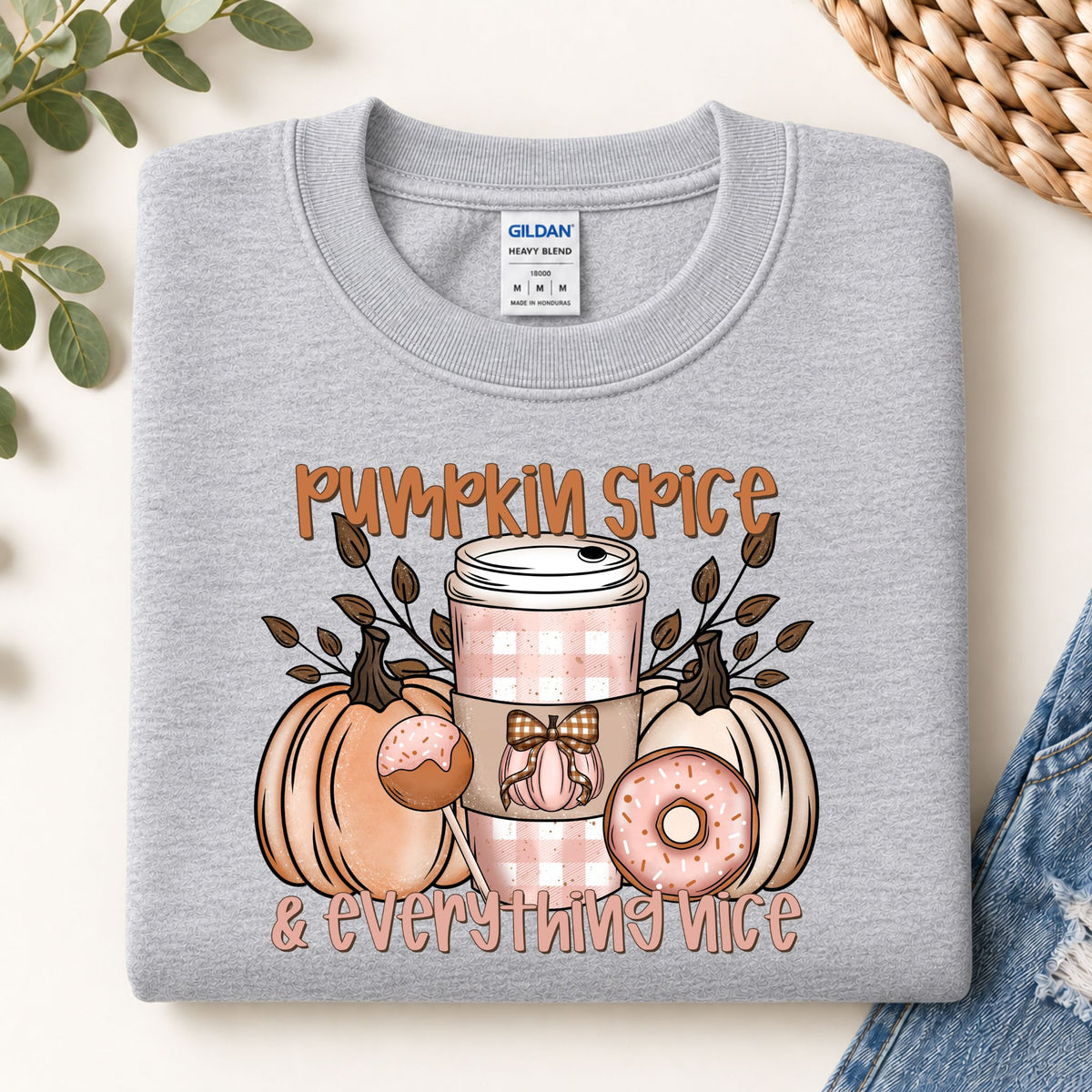Light gray sweatshirt with pumpkin spice and everything nice chest graphic, crew neck