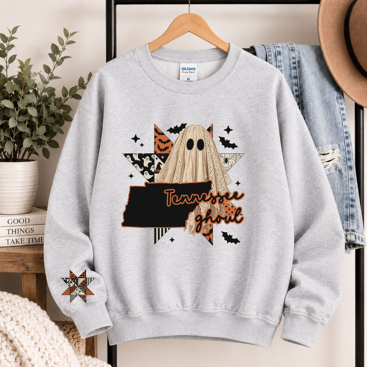 Light gray crewneck sweatshirt with Tennessee ghoul graphic and state silhouette
