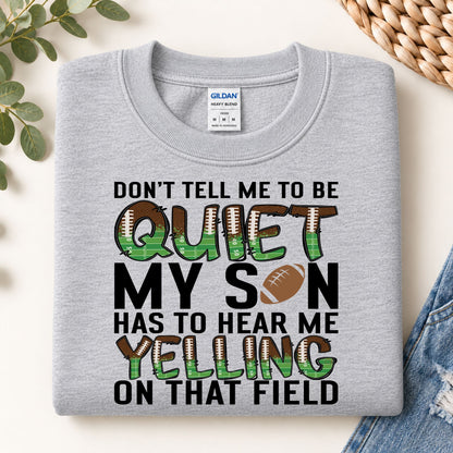 Grey football sweatshirt with bold "QUIET" graphic and text "MY SON HAS TO HEAR ME YELLING"