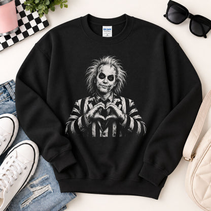 Black crewneck sweatshirt with monochrome portrait graphic on the front