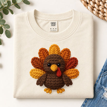 Cream crewneck sweatshirt with turkey appliqué centered on the chest.