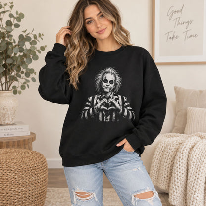 Black crewneck sweatshirt with monochrome portrait graphic on the chest