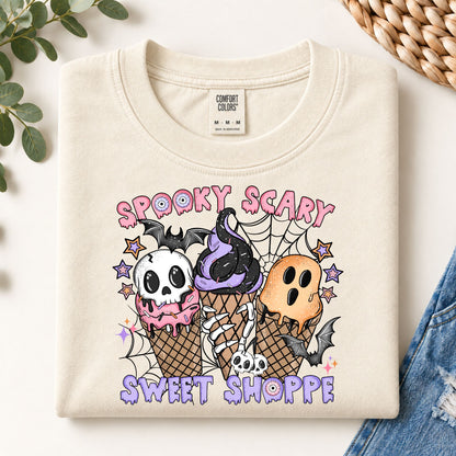 Cream crewneck sweatshirt with large front print of skulls and ice-cream cones