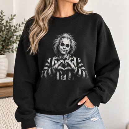 Black crewneck sweatshirt with monochrome portrait graphic on the chest