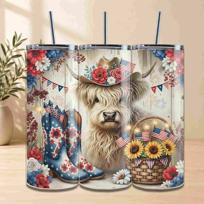 Tumbler with a design of a cow wearing a cowboy hat, surrounded by American flags, boots, and flowers.