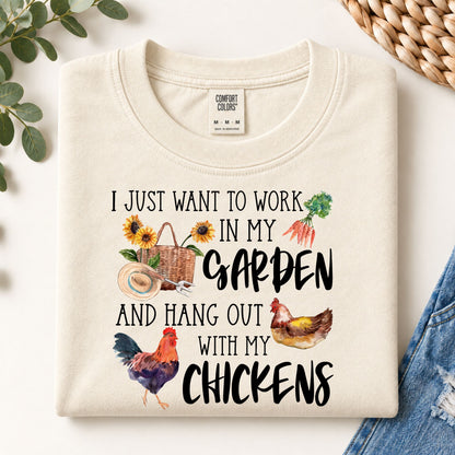 Cream Comfort Colors sweatshirt with colorful garden and chicken text graphic, crewneck.