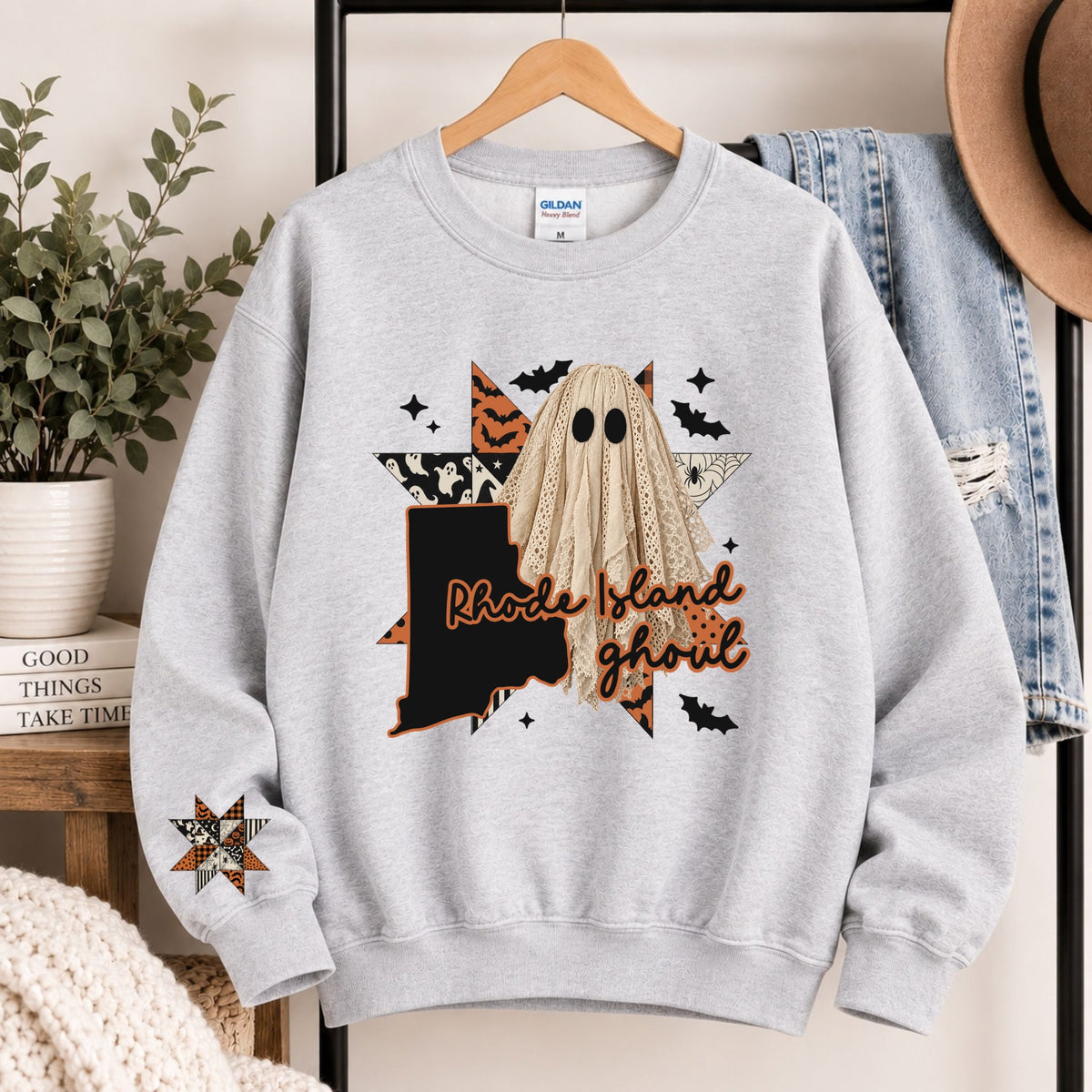 Light gray crewneck sweatshirt with Rhode Island ghoul graphic and state silhouette
