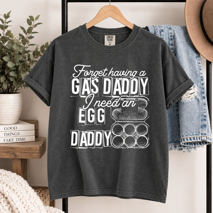 Dark gray tee on hanger; white GAS DADDY egg and daddy graphic front