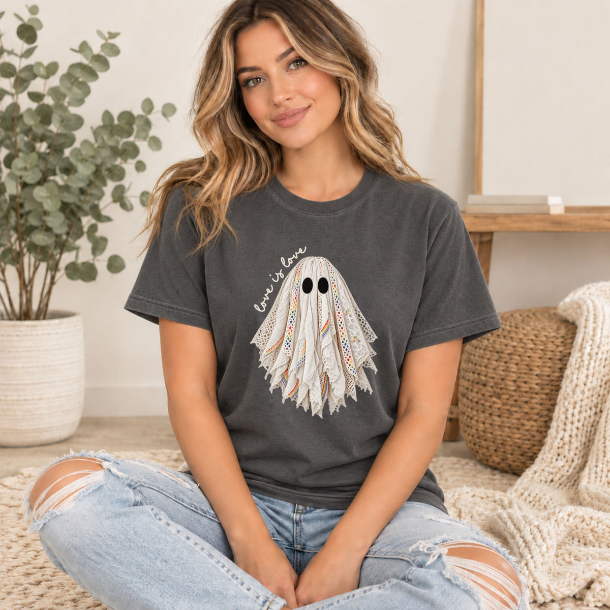 Dark gray graphic tee with layered lace ghost face artwork and crew neck