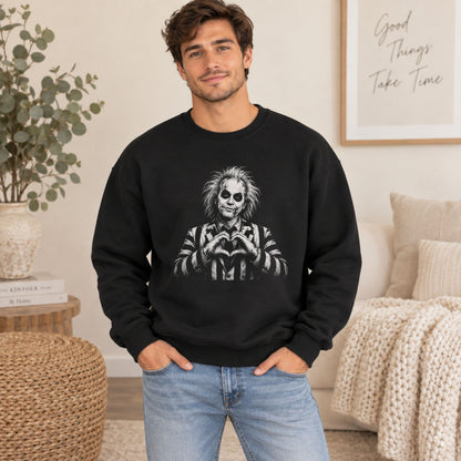 Black crewneck sweatshirt with monochrome portrait graphic centered on the chest