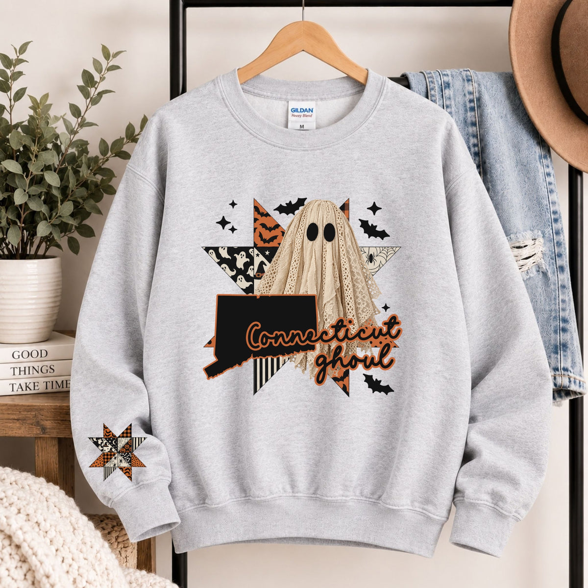 Light gray crewneck sweatshirt with Connecticut state ghost Halloween graphic