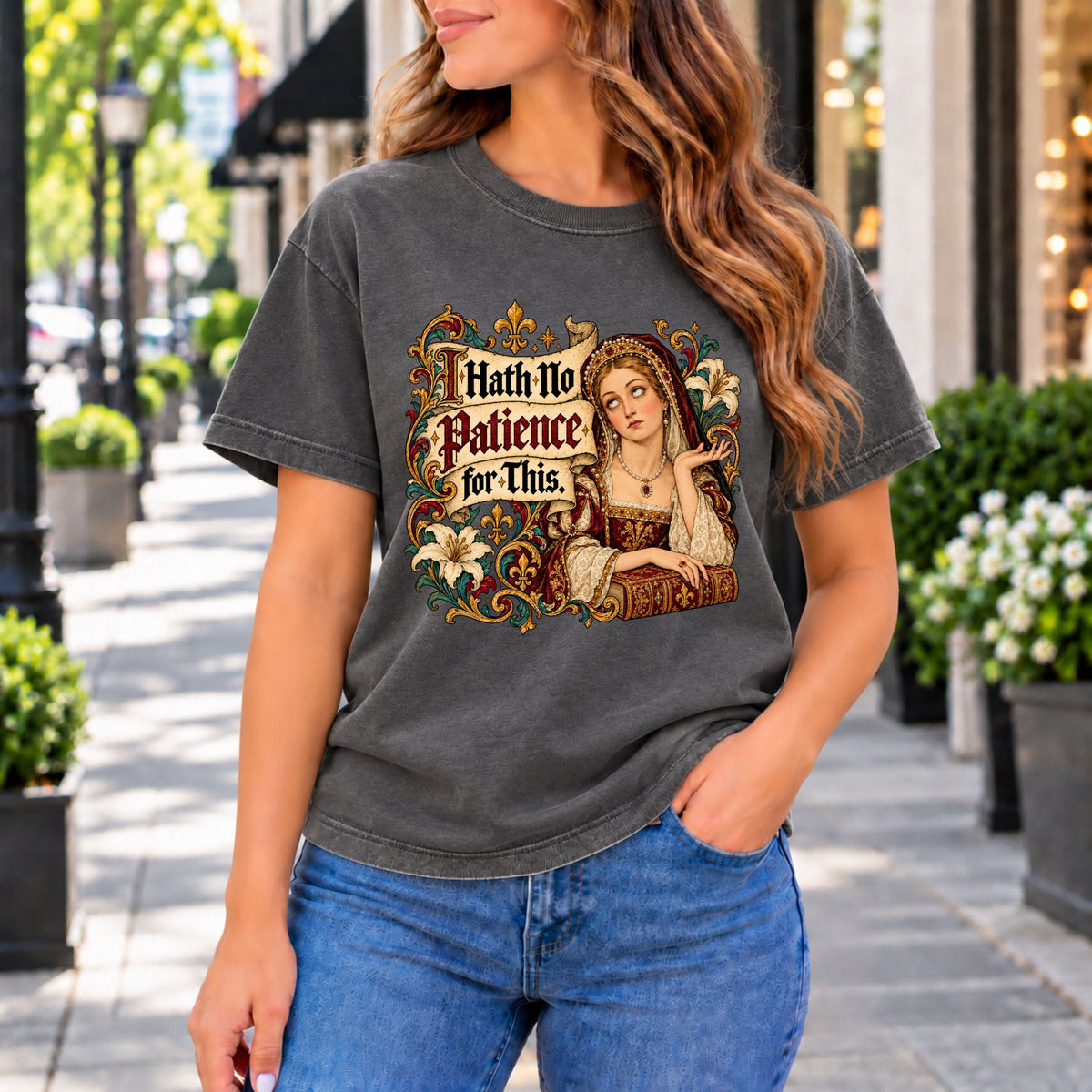 Vintage graphic tee, dark gray with queen portrait and ornate text print.