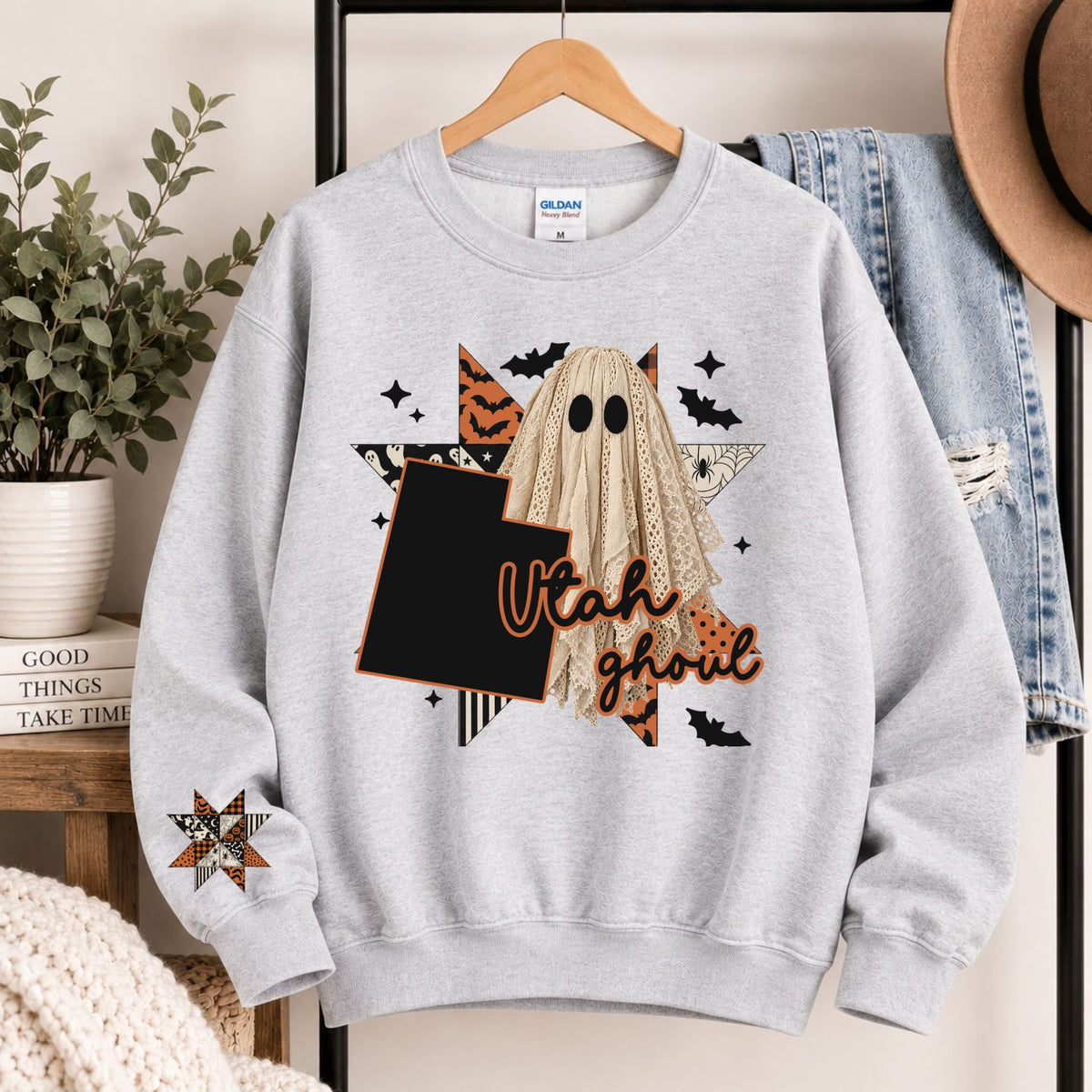 Light gray crewneck sweatshirt with Utah ghoul graphic and state silhouette