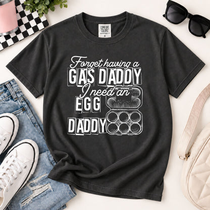 Dark gray graphic crewneck tee with white GAS DADDY egg and daddy artwork