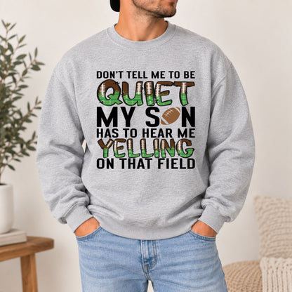 Grey football sweatshirt on male model with "QUIET" and "MY SON HAS TO HEAR ME" print