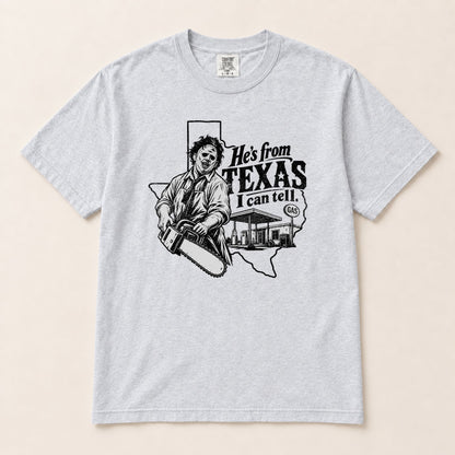 Heather gray horror graphic T-shirt with chainsaw character and 'He's from TEXAS' text