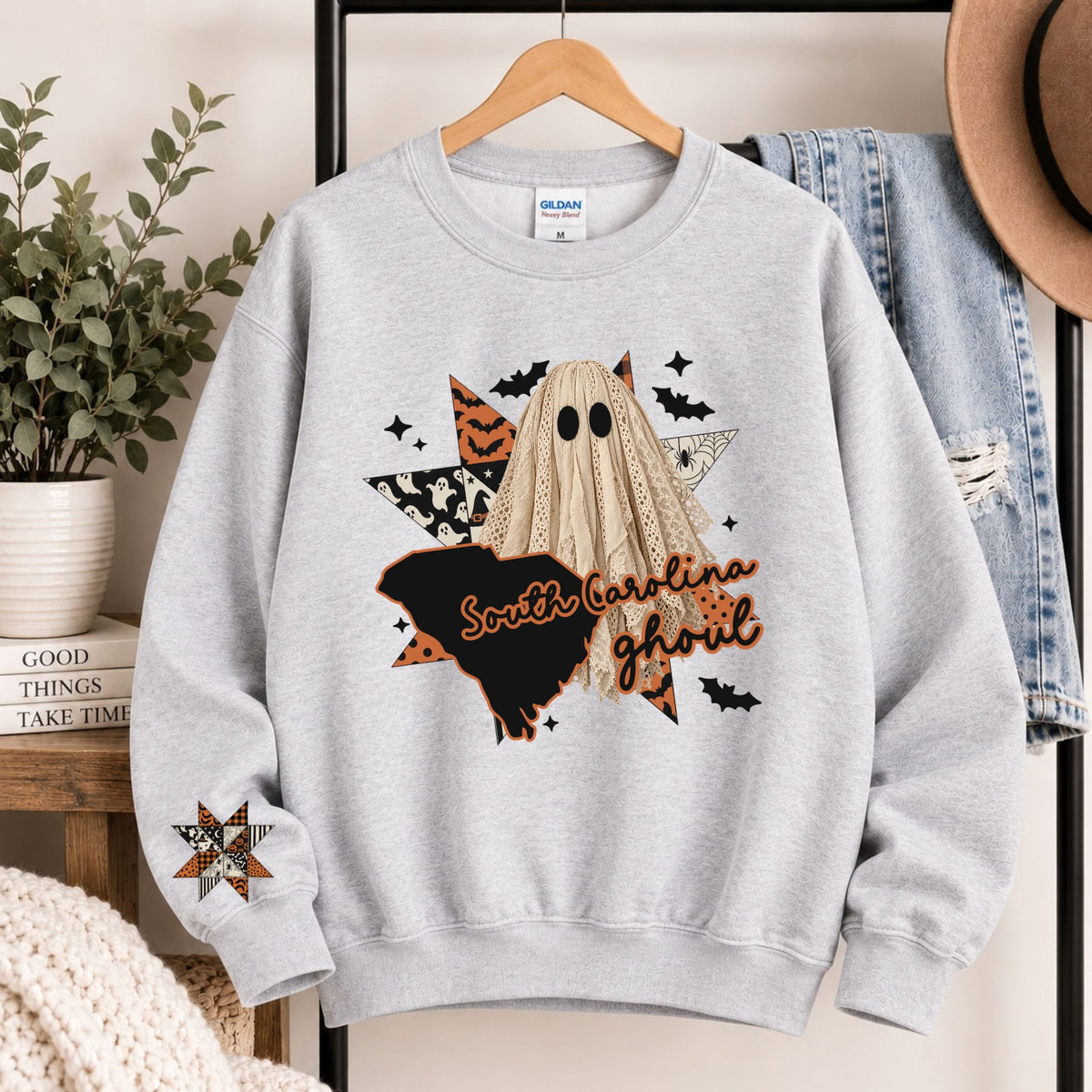 Light gray crewneck sweatshirt with hooded ghost and South Carolina ghoul graphic