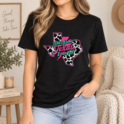 Black graphic T-shirt with “She’s from Texas I can tell” Texas silhouette and dots