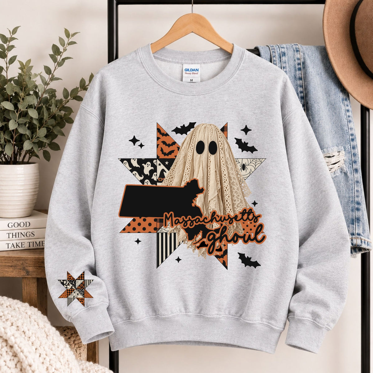 Light gray crewneck sweatshirt with Massachusetts ghoul state graphic and burlap ghost hood