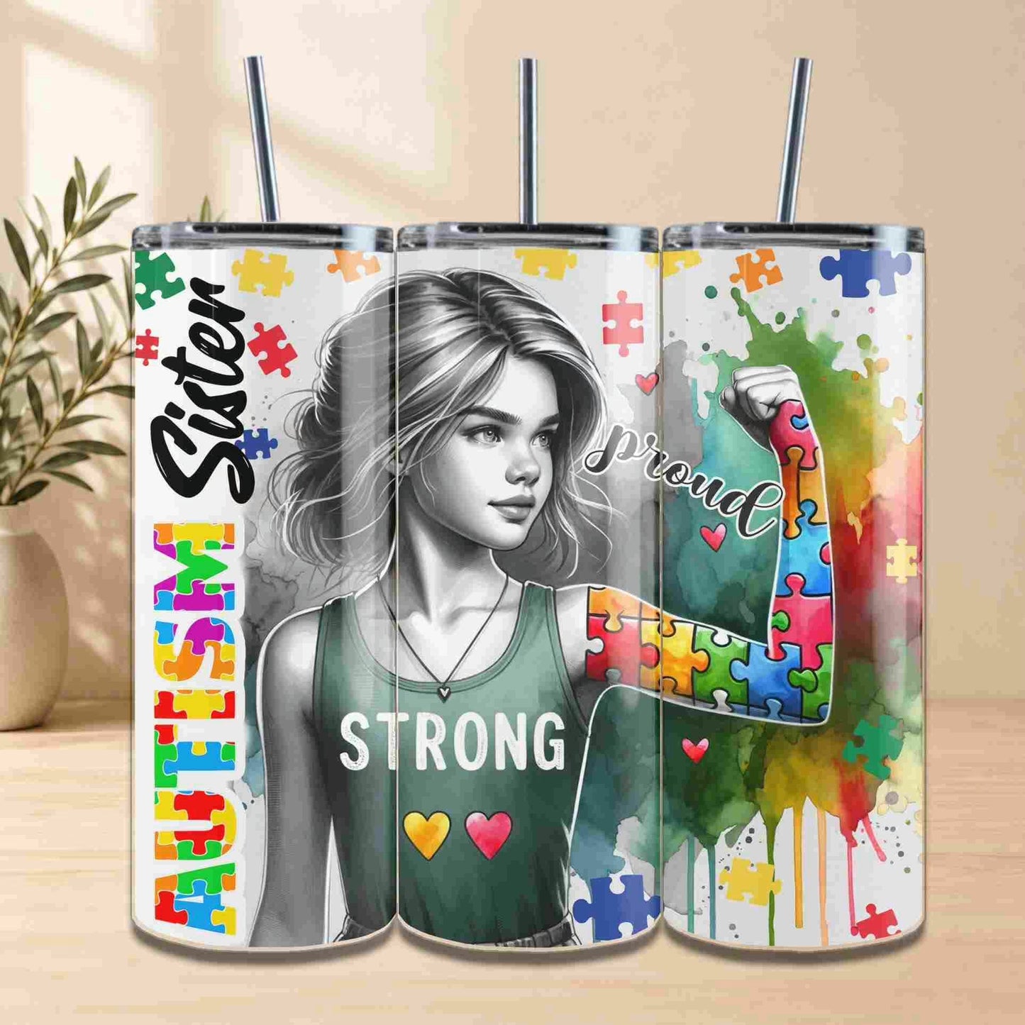 Tumbler with colorful design featuring a woman and text on a wooden surface.