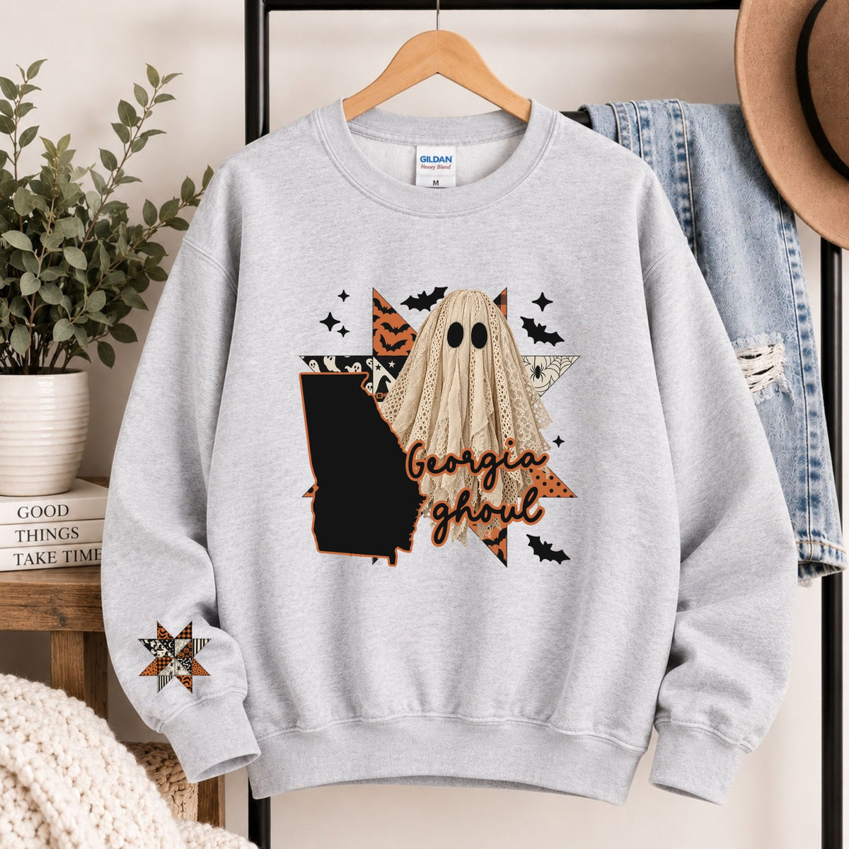 Light gray crewneck sweatshirt with Georgia state ghost Halloween graphic