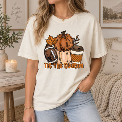 Cream crewneck graphic tee with pumpkin, coffee cup, and “Tis the Season” design