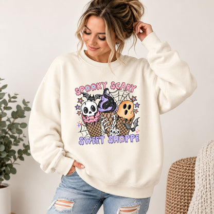 Cream Halloween sweatshirt with front graphic of skulls and ice-cream cones
