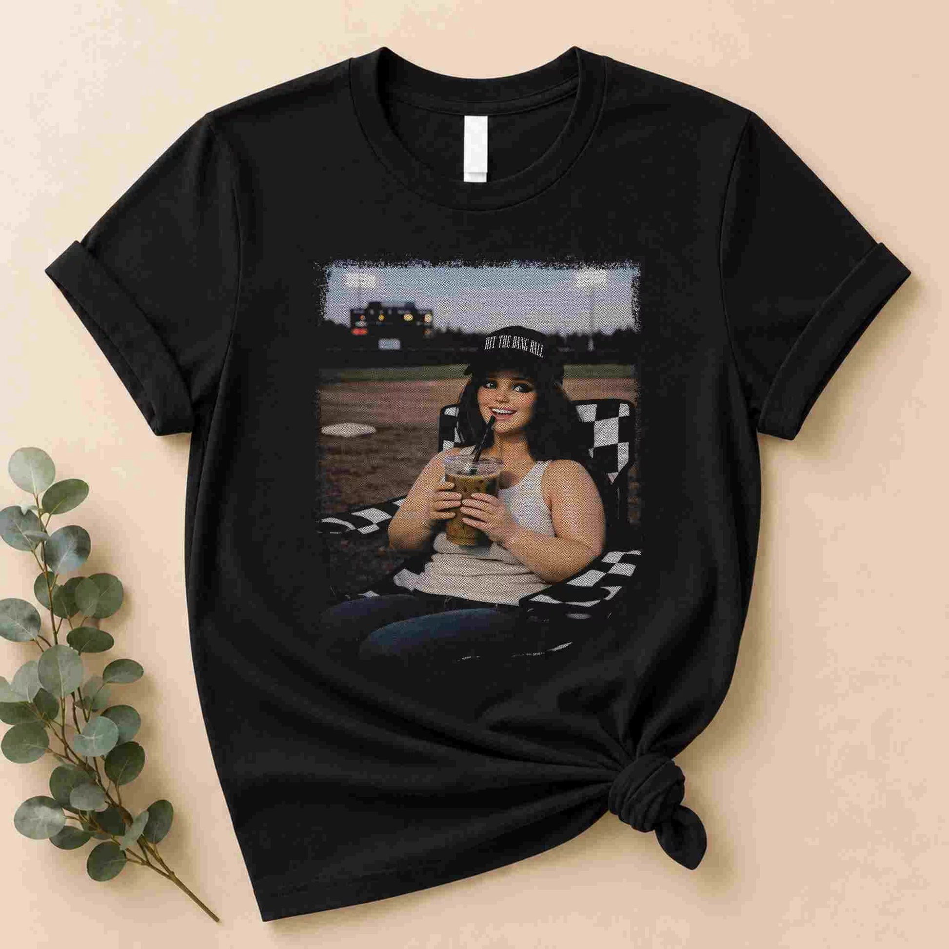 The Baseball Mom Iced Coffee Bleacher Queen Graphic Tee by Becca's Banging Designs LLC is a fun, affordable tee for proud softball mamas, perfect for trendy women who love unique graphic t-shirts.