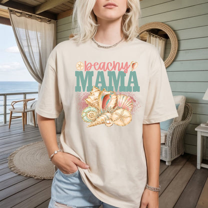 Cream crewneck graphic T-shirt with “beachy” “MAMA” and colorful shell artwork