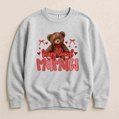 Gray sweatshirt with a teddy bear and 'bear loved mamaw' text on a beige background