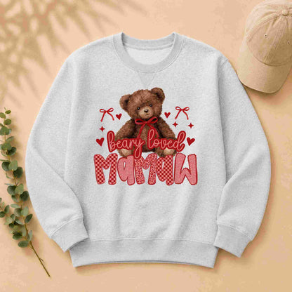 Gray sweatshirt with a teddy bear graphic and 'bearly loved mamaw' text on a beige background.