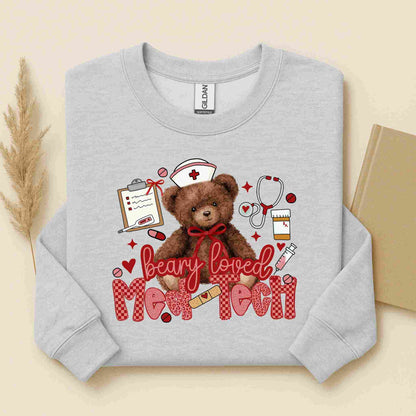 Gray sweatshirt with a teddy bear graphic and text on a beige background