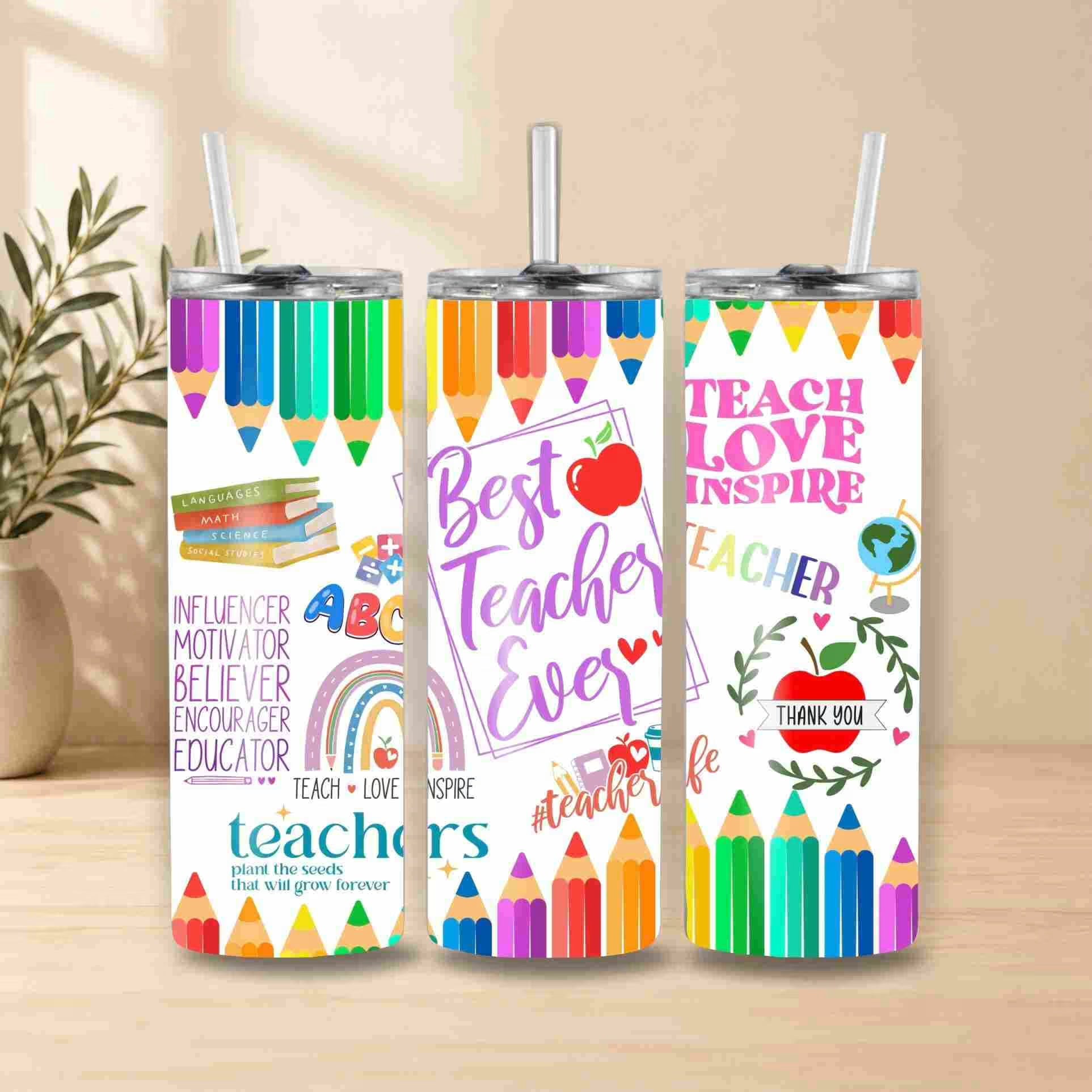 Three vibrant Best Teacher Ever 20oz tumblers feature rainbow pencil borders, motivational quotes, and school-themed graphics—perfect for a thoughtful teacher gift. Displayed on wood with a plant in the background.