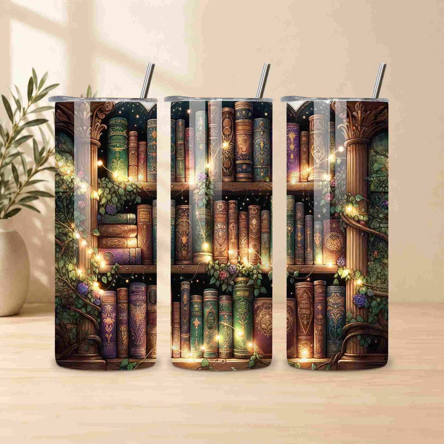 Three tumbler designs with a fantasy bookshelf theme on a wooden surface.