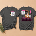 Gray t-shirt with a dog graphic and text on a beige background