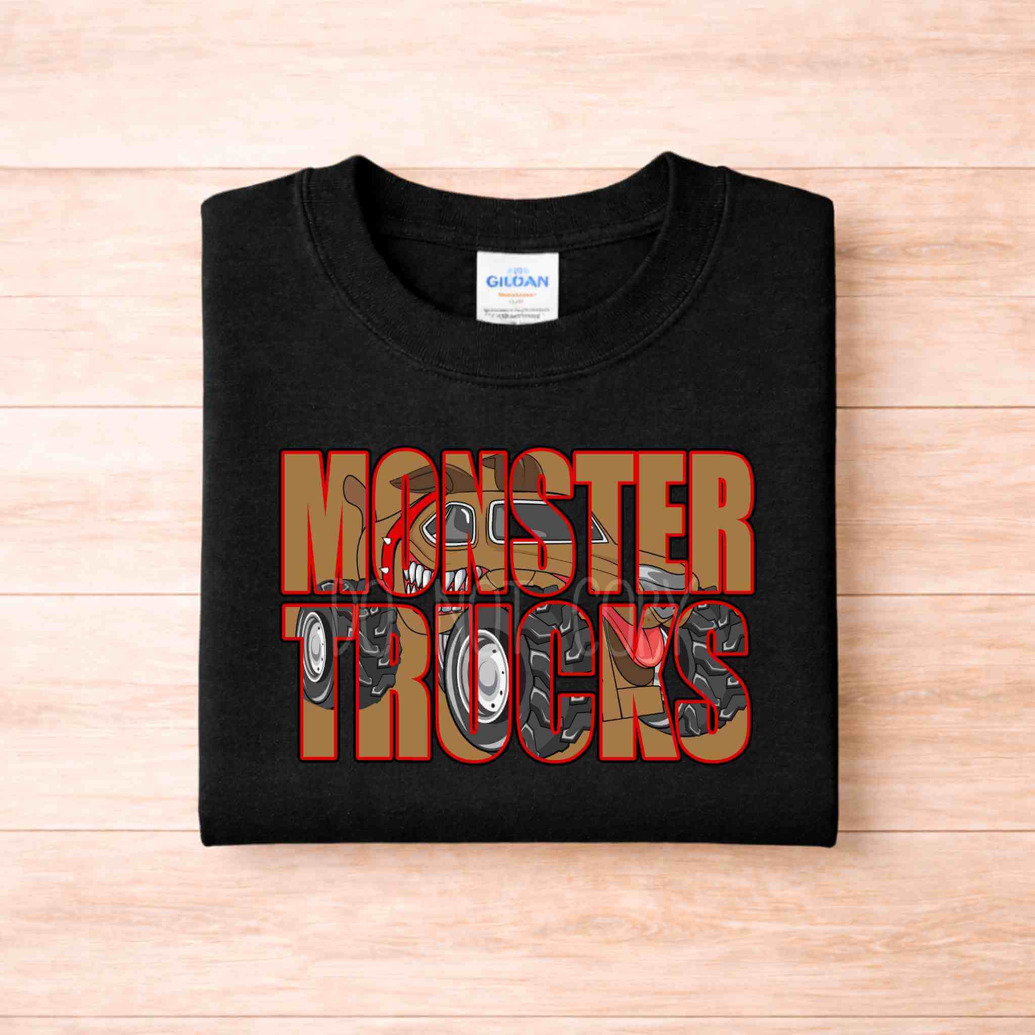 Monster Trucks Youth T Shirt Kid Graphic Tee featuring bold red lettering and truck graphic on a black Gildan tee.