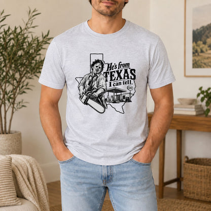 Heather gray horror graphic T-shirt with 'He's from TEXAS I can tell' print