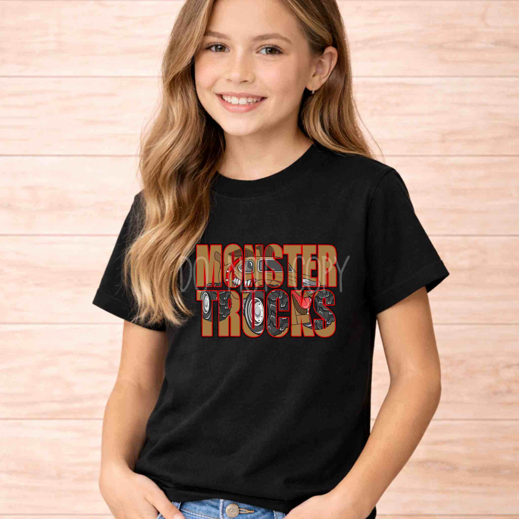 Monster Trucks Youth T Shirt Kid Graphic Tee worn by girl, featuring bold red lettering on a black background.
