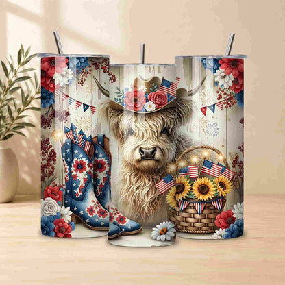 Tumbler with a design of a llama wearing a cowboy hat, surrounded by American flags, boots, and flowers on a wooden surface.