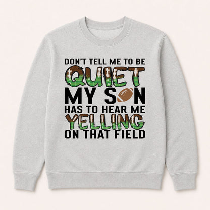 Grey sweatshirt product shot with "QUIET" football print reading "MY SON HAS TO HEAR ME"