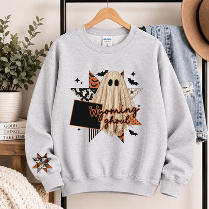 Light gray crewneck sweatshirt with Wyoming state ghost Halloween graphic