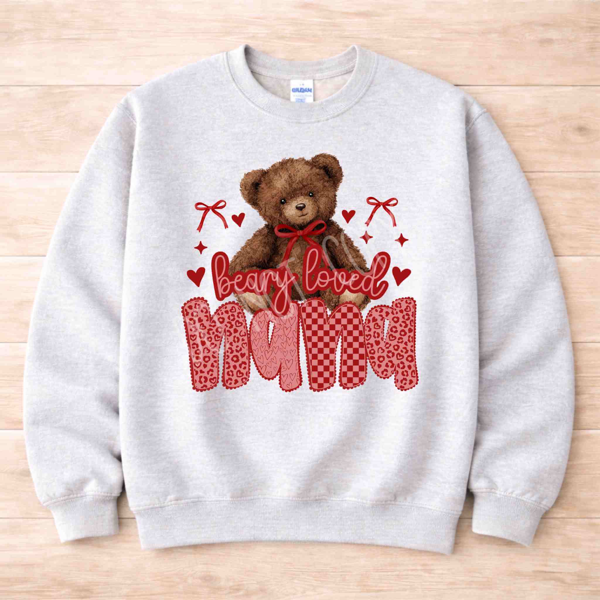 Beary Loved Mama Sweatshirt Comfort Style and Care featuring an adorable teddy bear and Valentine patterns.