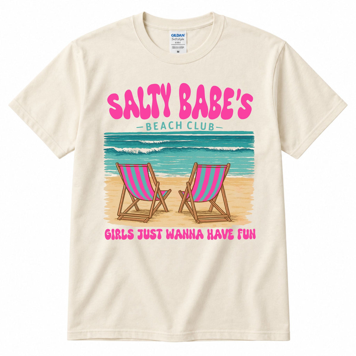 Cream graphic t-shirt with "SALTY BABE'S" beach club print and two pink striped chairs