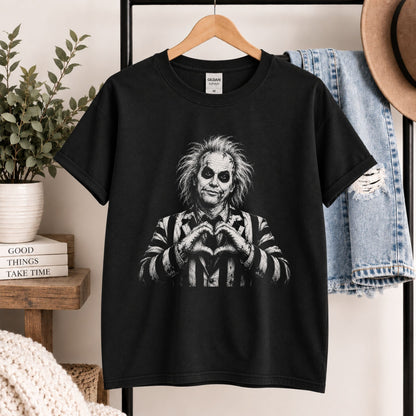Black T-shirt on hanger with heart-hands graphic of a spooky character