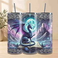 Tumbler with dragon design featuring a castle and moon in the background