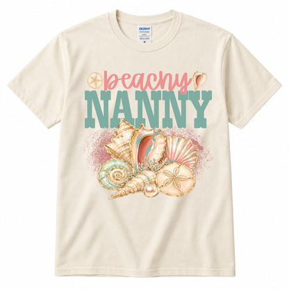 Cream crewneck graphic T-shirt with “beachy” and “NANNY” shell artwork