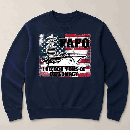 Navy blue sweatshirt with a graphic design featuring an aircraft carrier and text on a beige background