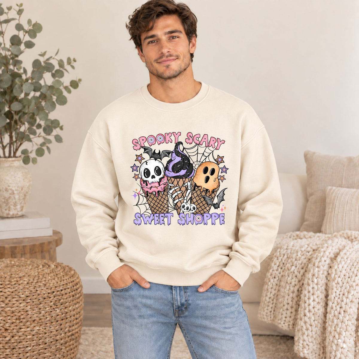 Off-white Halloween sweatshirt with cartoon ice-cream graphic and skull characters