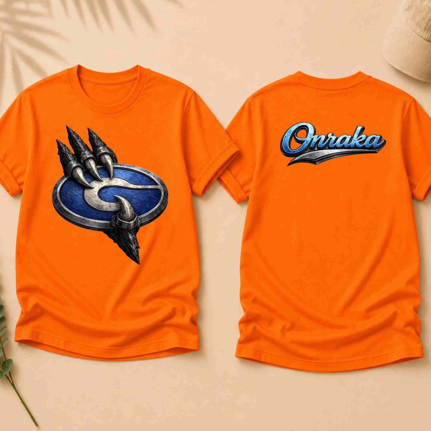 Orange t-shirt with a logo on the front and 'Onraka' text on the back, displayed on a beige surface.